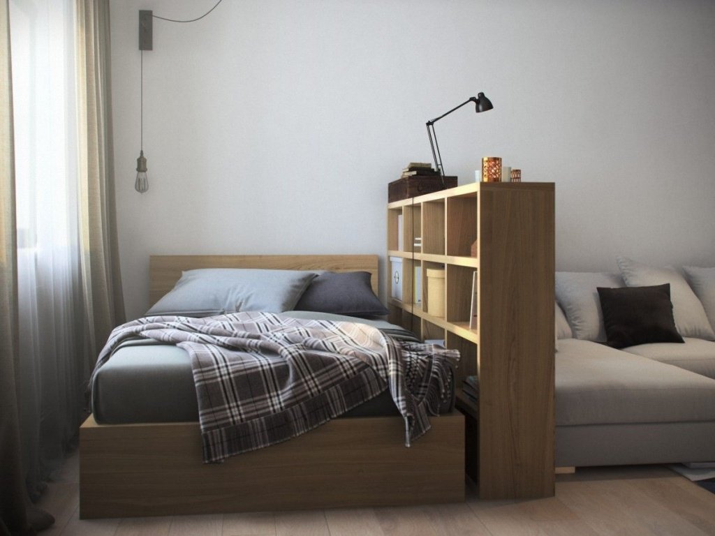 зонированная кровать в гостиной